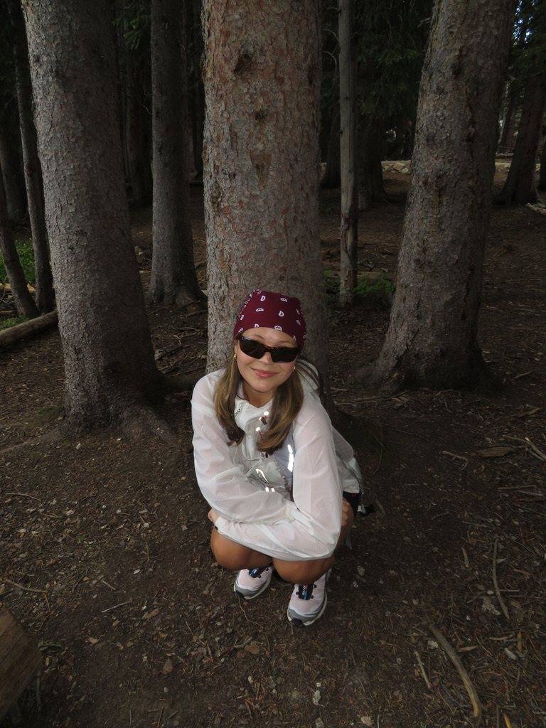 Cami hiking in the forest