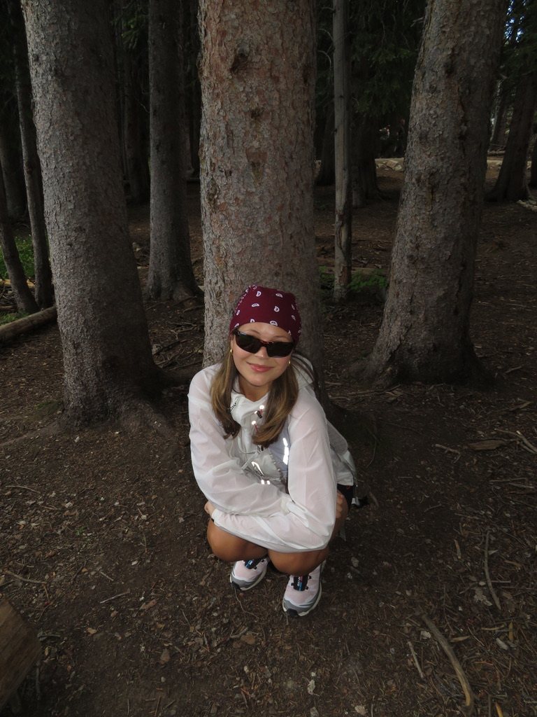 Cami hiking in the forest