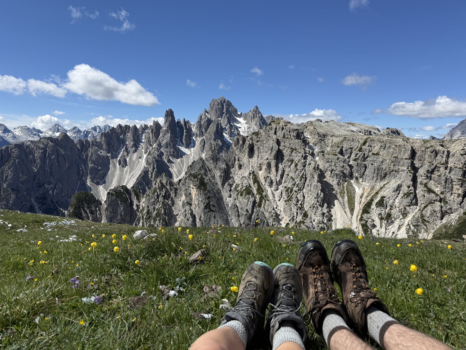Hiking boots overlooking the Dolomites
